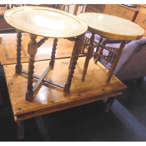 50 - A lot comprising a Moorish style circular brass topped folding table, another folding table with bra... 