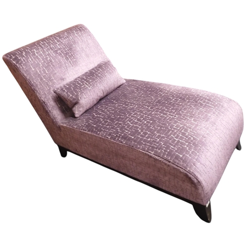 54 - A contemporary purple velvet upholstered John Lewis chaise longue with loose cushion on ebonised wed... 