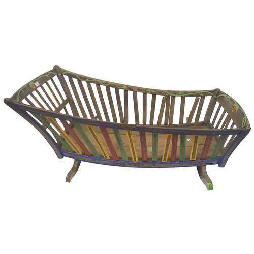 70 - A 20th century beech painted rocking crib, 54cm high x 115cm long x 72cm wide 