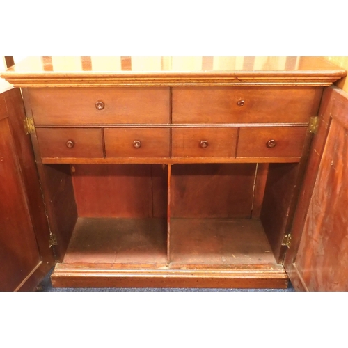 75 - A Victorian mahogany side cabinet with pair of panel doors concealing two long over four short drawe... 