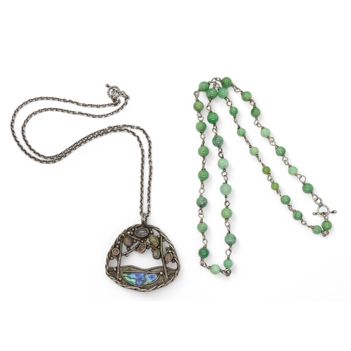 2724 - AN ARTS & CRAFTS STYLE COLLECTIONa white metal paua shell pendant set with jelly opals, length 4... 