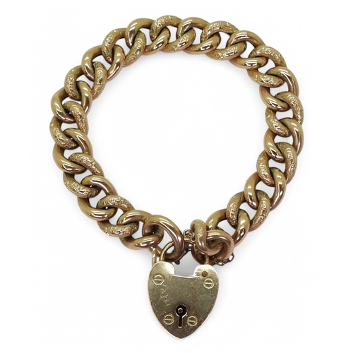 2725 - A 9CT GOLD CURB CHAIN BRACELETwith heart shaped clasp and alternate patterned links. Hallmarked Birm... 