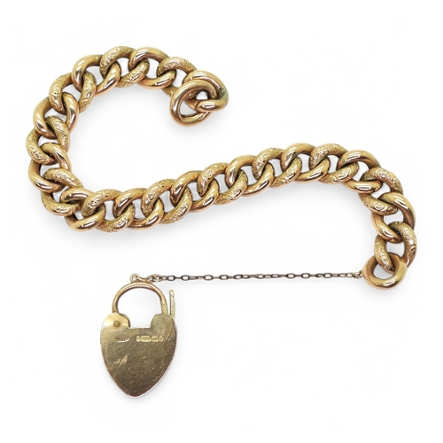 2725 - A 9CT GOLD CURB CHAIN BRACELETwith heart shaped clasp and alternate patterned links. Hallmarked Birm... 