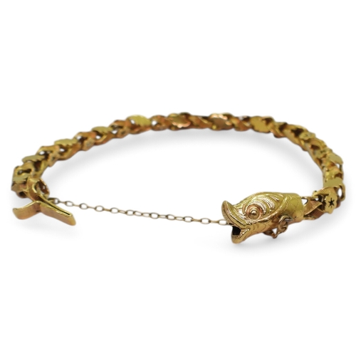 2736 - A SNAKE BRACELETwith decorative leaf and flower links and a box clasp made in bright yellow metal. L... 