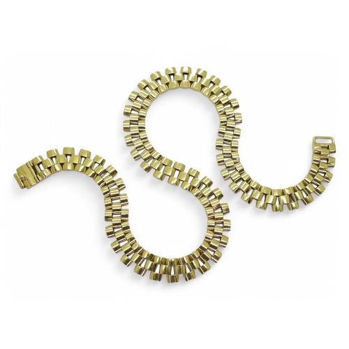 2737 - AN 18CT NECKLACEwith three rows of brick shaped links, length 41cm, width 1.1cm, weight 74.2gms ... 