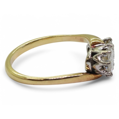 2738 - A TWIN STONE DIAMOND RINGmounted in 18ct yellow and white gold, and set with two diamonds with an es... 