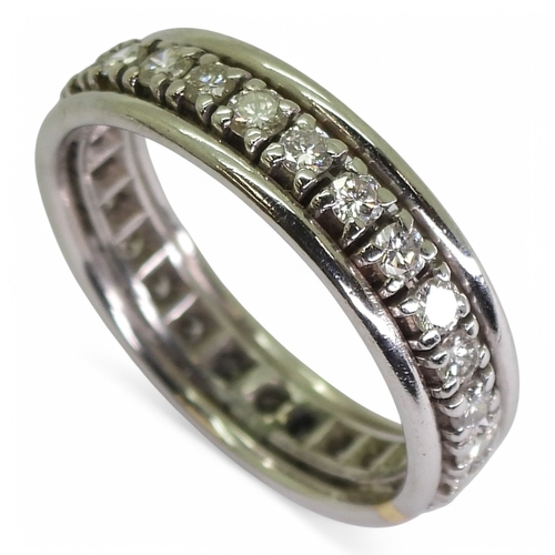 2739 - A DIAMOND FULL ETERNITY RINGstamped with the French eagle's head hallmark for 18ct white gold. Set w... 