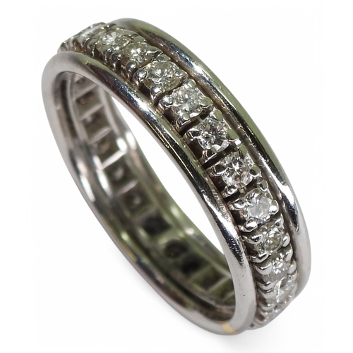 2739 - A DIAMOND FULL ETERNITY RINGstamped with the French eagle's head hallmark for 18ct white gold. Set w... 