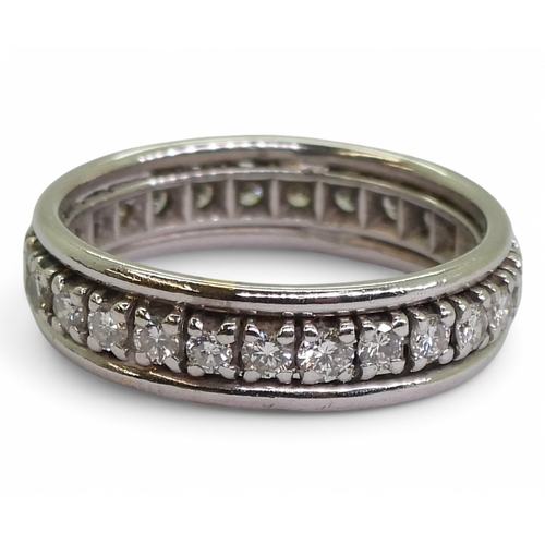 2739 - A DIAMOND FULL ETERNITY RINGstamped with the French eagle's head hallmark for 18ct white gold. Set w... 