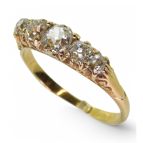 2741 - AN OLD CUT DIAMOND RINGwith a classic 18ct gold scroll mount. The five diamonds have an estimated ap... 