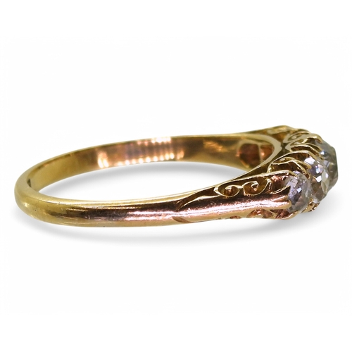 2741 - AN OLD CUT DIAMOND RINGwith a classic 18ct gold scroll mount. The five diamonds have an estimated ap... 