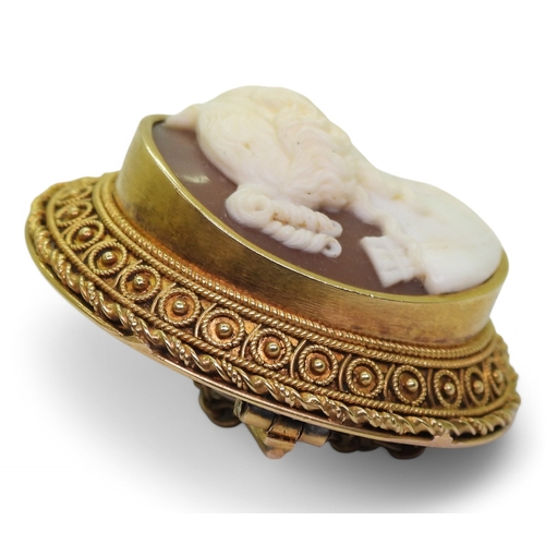 2742 - A COLLECTION OF CAMEOSa finely carved shell cameo of Artemis in a bright yellow metal brooch mount, ... 