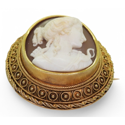 2742 - A COLLECTION OF CAMEOSa finely carved shell cameo of Artemis in a bright yellow metal brooch mount, ... 