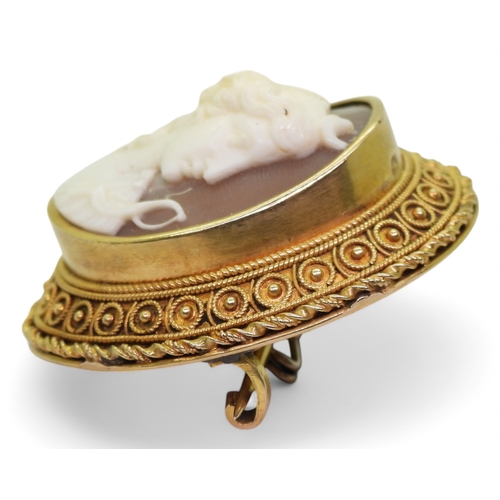 2742 - A COLLECTION OF CAMEOSa finely carved shell cameo of Artemis in a bright yellow metal brooch mount, ... 