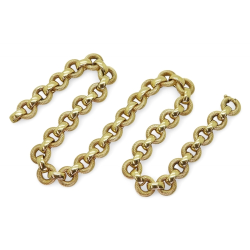 2744 - A FANCY CHAINwith hidden clasp, to the cable pattern links, stamped 750. Length 46cm, weight 75gms... 