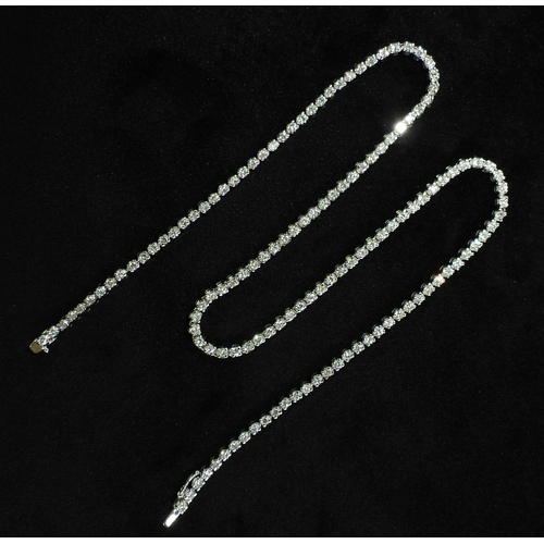 2745 - A DIAMOND RIVIERA NECKLACEset with estimated approx 4.80cts of brilliant cut diamonds in 18ct white ... 