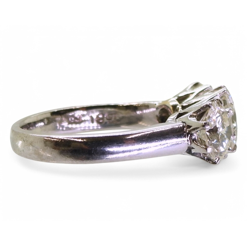 2749 - A SUBSTANTIAL THREE STONE RINGthe diamonds have an estimated combined total of 3.01cts, set in 18ct ... 