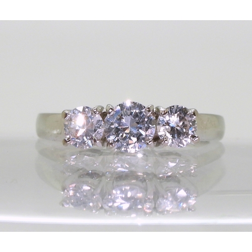 2751 - A THREE STONE DIAMOND RINGset with estimated approx 1.04cts of brilliant cut diamonds. Finger size M... 