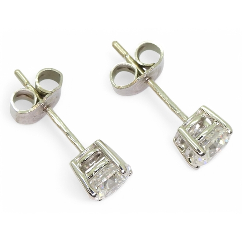 2752 - DIAMOND STUD EARRINGSthe two brilliant cut diamond of 0.75cts and 0.76cts are set in 18ct gold four ... 