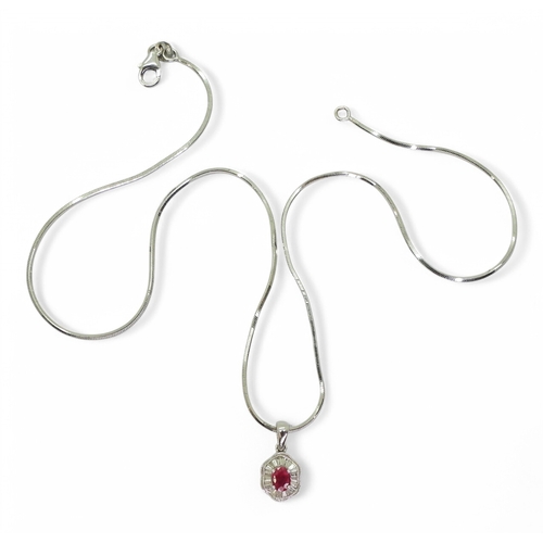 2754 - A RUBY & DIAMOND SUITEthe earrings set with oval cut rubies of approx 5mm x 4mm, surrounded with... 