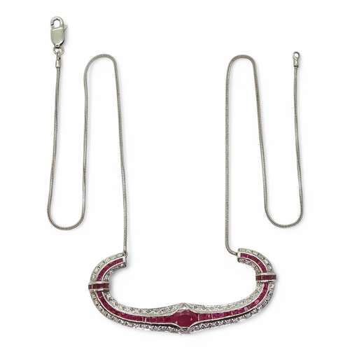 2756 - A RUBY & DIAMOND NECKLACEwith a central oval cut ruby of approx 7mm x 5mm , with further mixed c... 