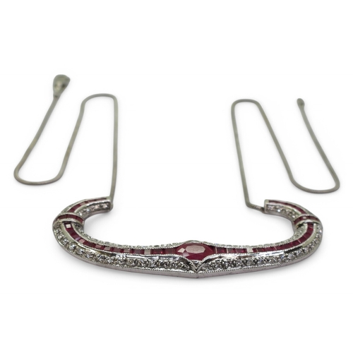 2756 - A RUBY & DIAMOND NECKLACEwith a central oval cut ruby of approx 7mm x 5mm , with further mixed c... 