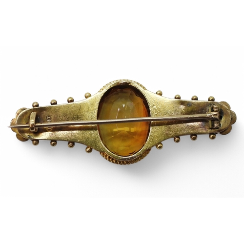 2757 - TWO VICTORIAN BROOCHESan 15ct etruscan revival brooch set with a substantial citrine and pearl flowe... 