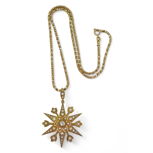 2758 - A VICTORIAN STAR PENDANT BROOCHset with a central diamond of estimated approx 0.15cts, and pearls, d... 