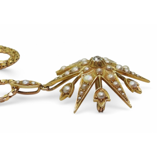 2758 - A VICTORIAN STAR PENDANT BROOCHset with a central diamond of estimated approx 0.15cts, and pearls, d... 