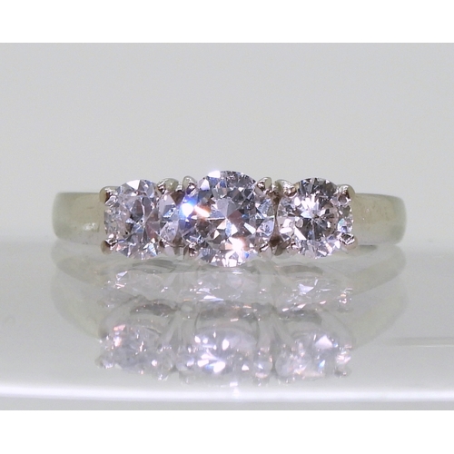 2751 - A THREE STONE DIAMOND RINGset with estimated approx 1.04cts of brilliant cut diamonds. Finger size M... 