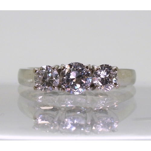 2751 - A THREE STONE DIAMOND RINGset with estimated approx 1.04cts of brilliant cut diamonds. Finger size M... 