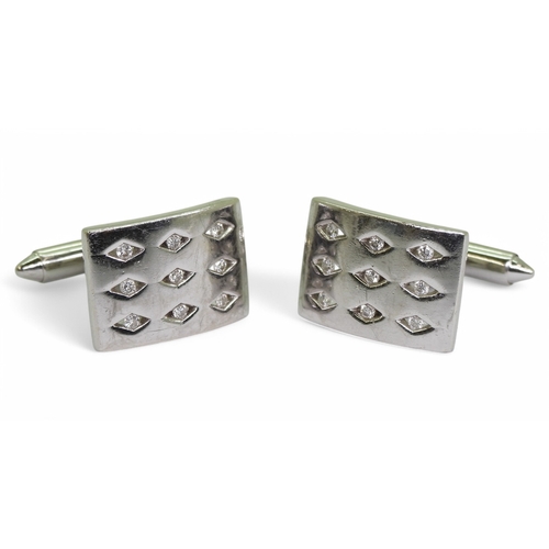 2769 - A PAIR OF DIAMOND CUFFLINKSmade in 9ct white gold each cufflink is set with nine brilliant cuts in d... 