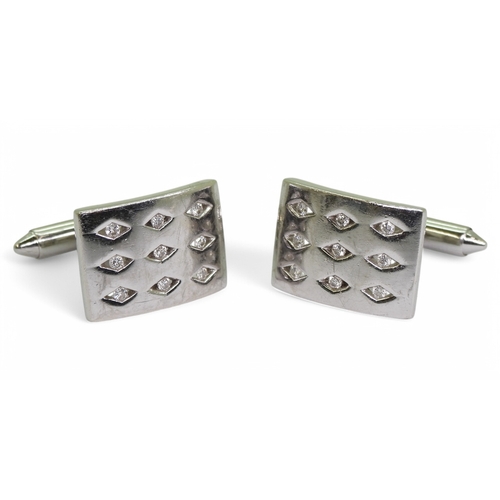 2769 - A PAIR OF DIAMOND CUFFLINKSmade in 9ct white gold each cufflink is set with nine brilliant cuts in d... 