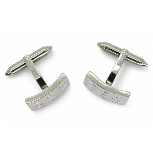 2769 - A PAIR OF DIAMOND CUFFLINKSmade in 9ct white gold each cufflink is set with nine brilliant cuts in d... 