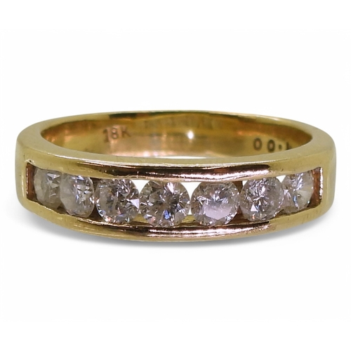 2772 - AN ETERNITY RINGmade in 18ct yellow gold and set with seven diamonds, with an estimated approx diamo... 