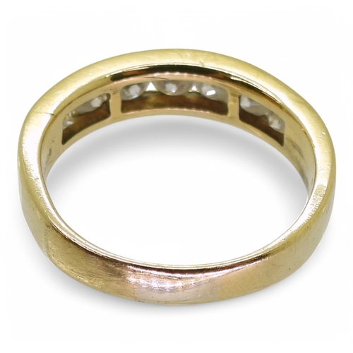 2772 - AN ETERNITY RINGmade in 18ct yellow gold and set with seven diamonds, with an estimated approx diamo... 