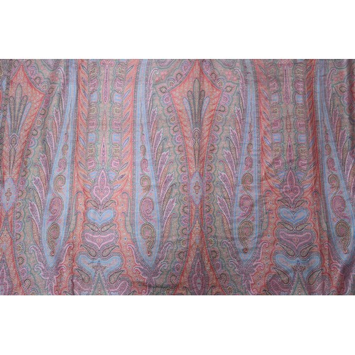 6002 - A large Paisley shawl, with central quartered decoration with green, red, cream and blue ground, 154... 