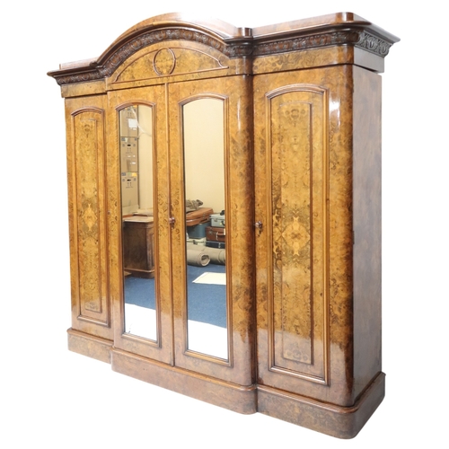 2015 - A VICTORIAN BURR WALNUT VENEERED THREE PIECE BEDROOM SUITEconsisting four door break front wardrobe ... 