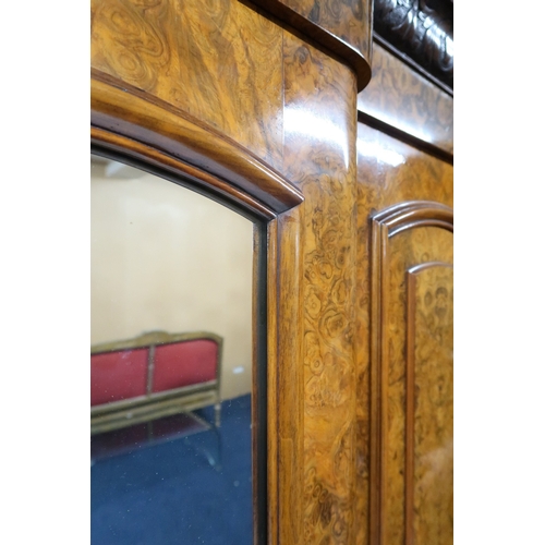 2015 - A VICTORIAN BURR WALNUT VENEERED THREE PIECE BEDROOM SUITEconsisting four door break front wardrobe ... 