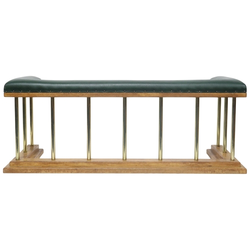 2016 - A 20TH CENTURY OAK AND BRASS CLUB FIRE FENDER with green Rexine upholstered top over brass rail... 