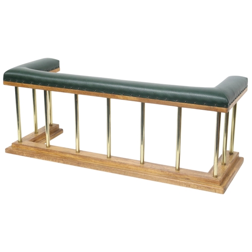 2016 - A 20TH CENTURY OAK AND BRASS CLUB FIRE FENDER with green Rexine upholstered top over brass rail... 