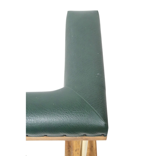 2016 - A 20TH CENTURY OAK AND BRASS CLUB FIRE FENDER with green Rexine upholstered top over brass rail... 