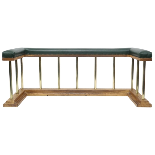 2016 - A 20TH CENTURY OAK AND BRASS CLUB FIRE FENDER with green Rexine upholstered top over brass rail... 