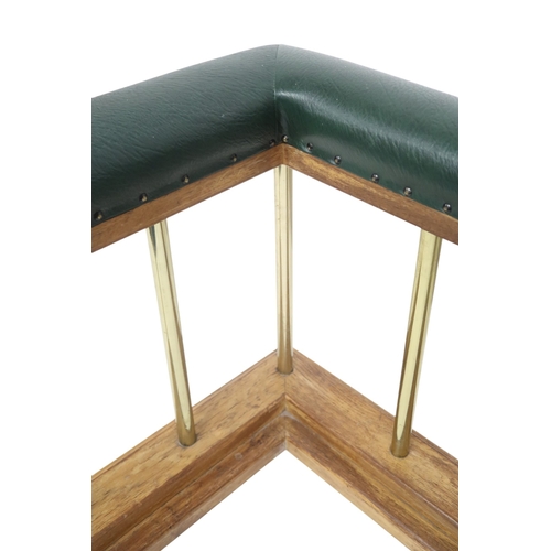 2016 - A 20TH CENTURY OAK AND BRASS CLUB FIRE FENDER with green Rexine upholstered top over brass rail... 