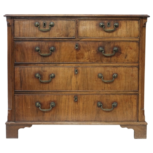 2018 - A 19TH CENTURY WALNUT VENEERED CHEST OF DRAWERS with two short over three long drawers all with... 