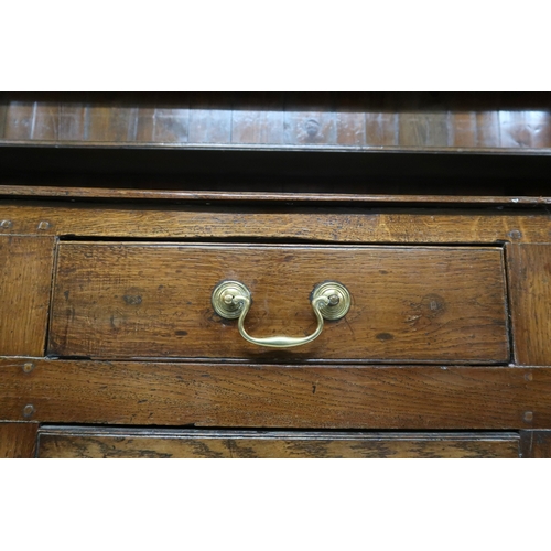 2022 - AN 18TH/19TH CENTURY OAK KITCHEN DRESSERplate rack with moulded cornice over three open shelves on b... 