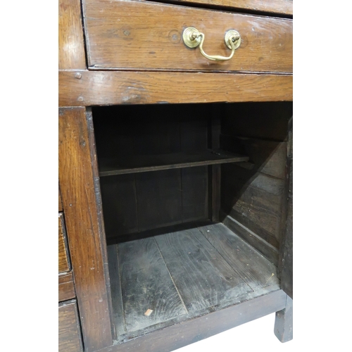 2022 - AN 18TH/19TH CENTURY OAK KITCHEN DRESSERplate rack with moulded cornice over three open shelves on b... 