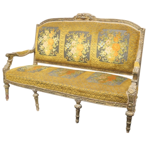 2030 - AN 18TH CENTURY LOUIS XVI GILTWOOD GESSO FRAMED SETTEEwith floral upholstered back and seat on six r... 