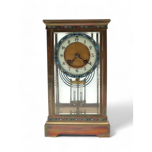 2161 - A FRENCH CHAMPLEVE ENAMEL CLOCKwith brass and glass case, the dial with white enamel chapter ring wi... 