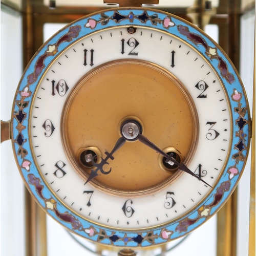 2161 - A FRENCH CHAMPLEVE ENAMEL CLOCKwith brass and glass case, the dial with white enamel chapter ring wi... 